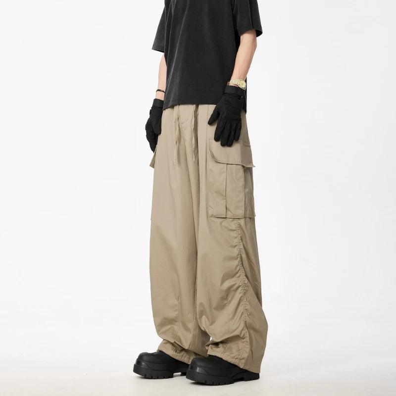 Harajuku Cargo Pants Men Retro Hip-hop Multi-pocket Trousers Solid Color Pleated Loose Paratrooper Pants Unisex Casual Bottoms